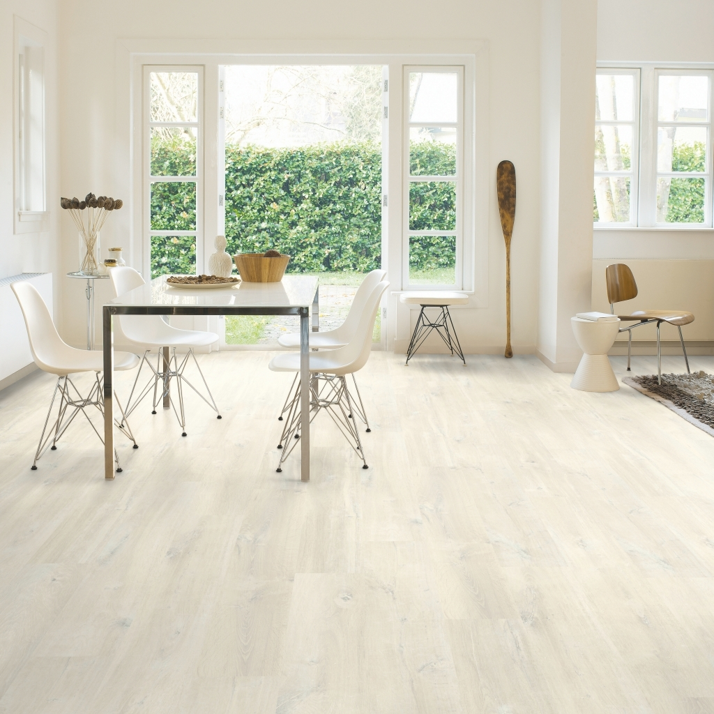 A picture of a room with laminate flooring