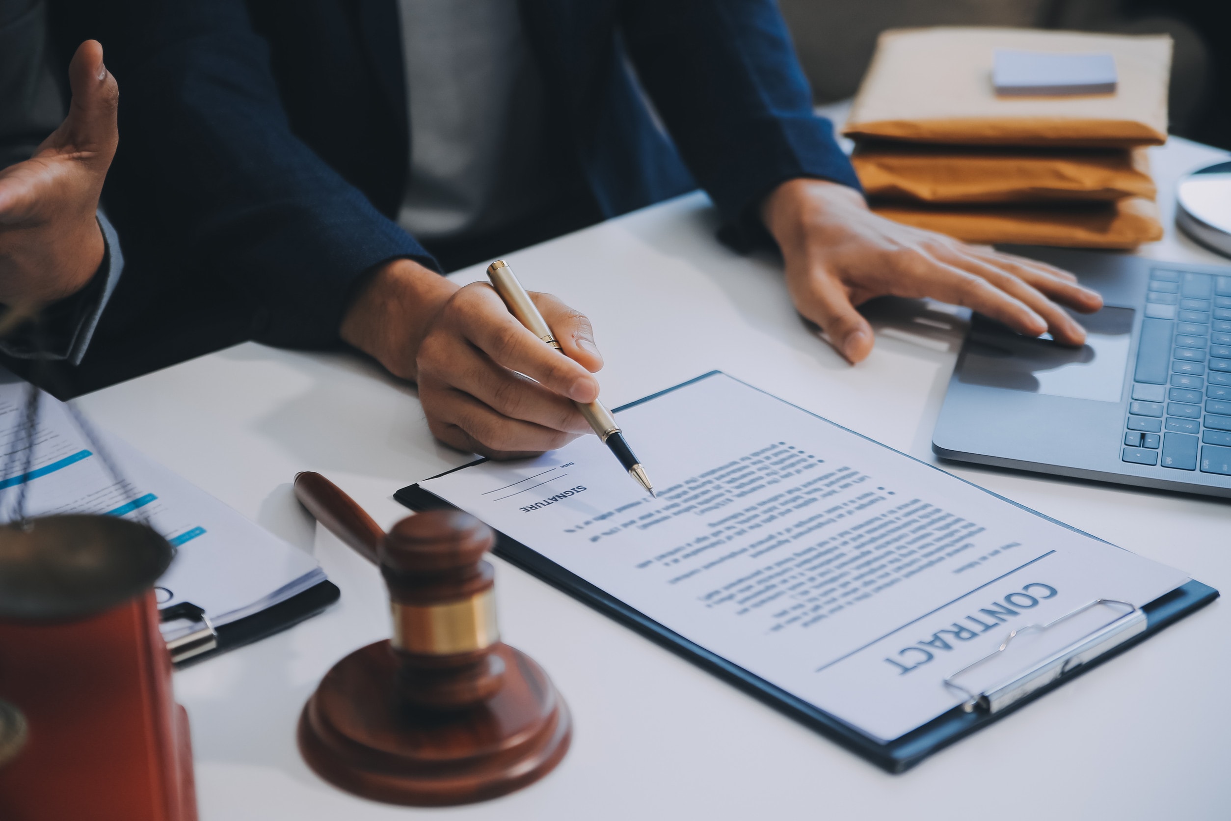 A surgical negligence claims solicitor signing a contract