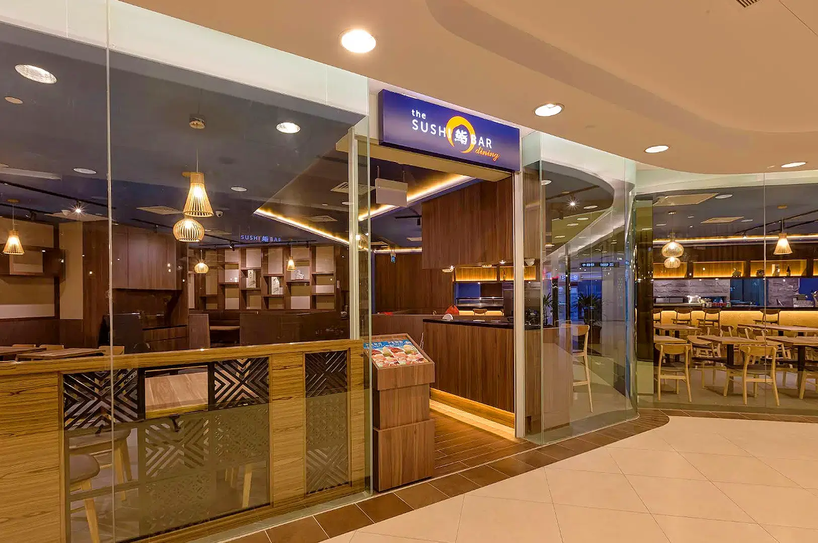 The Sushi Bar Singapore Japanese restaurant entrance with modern dining interior