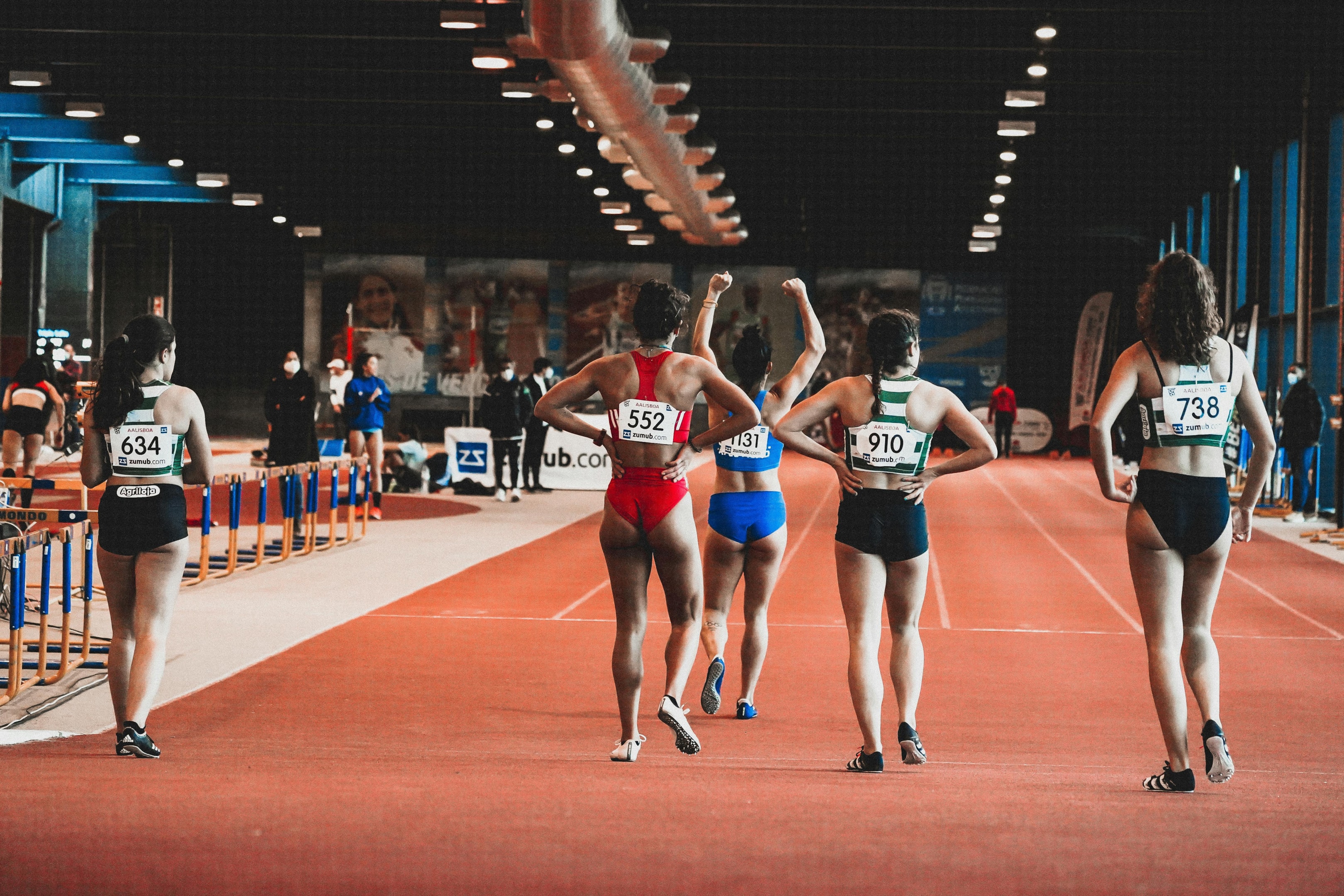 Photo by RUN 4 FFWPU: https://www.pexels.com/photo/group-of-athletes-standing-in-line-on-a-running-track-6504820/