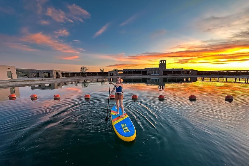 inflatable sup board at sunset