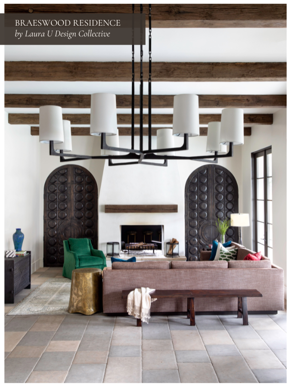 Minimalist wood Fireplace with wood trim Flanked by Two Carved Wooden Doors at Braeswood