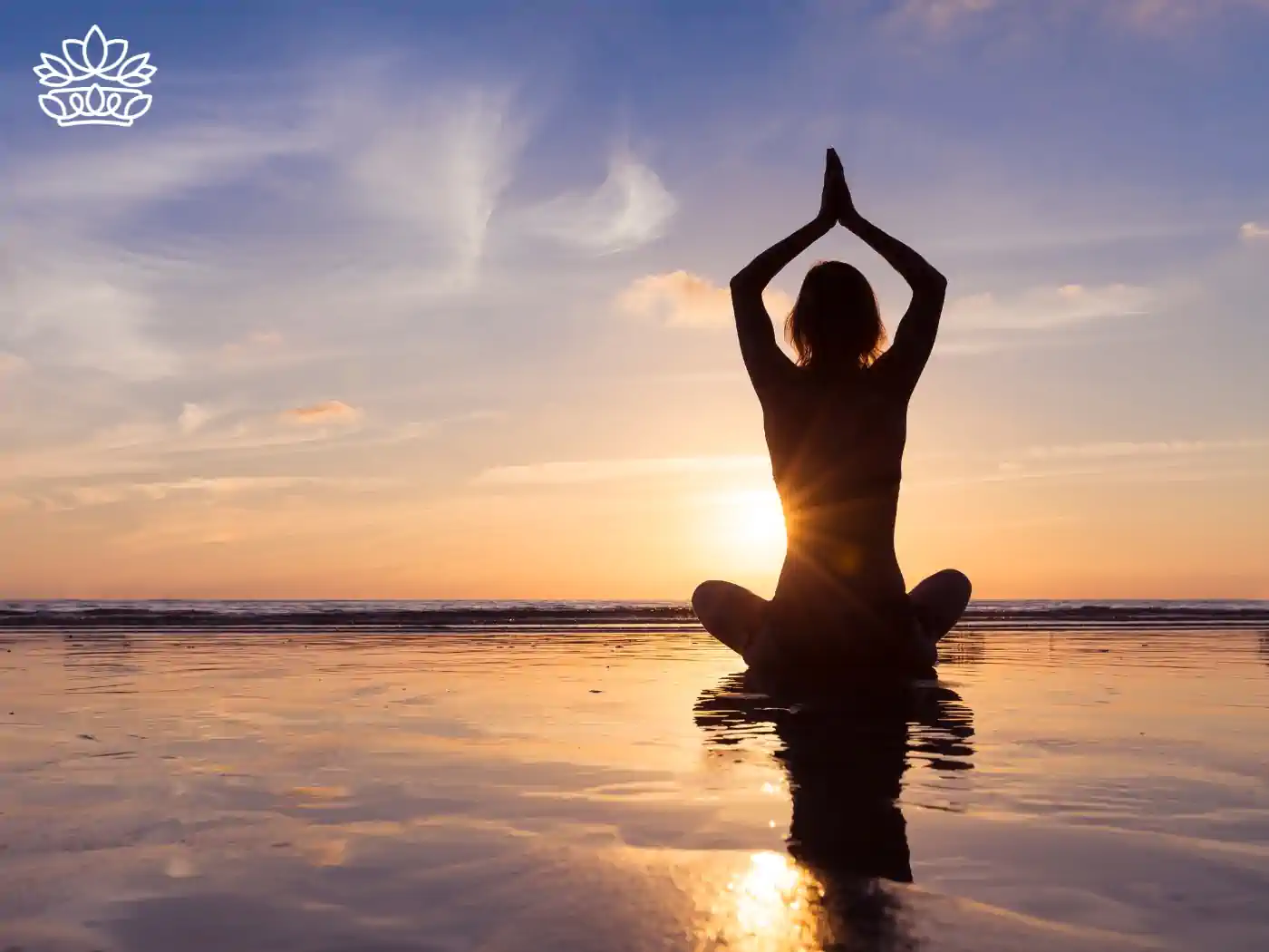 A silhouette of a person practicing yoga on the beach during sunset, enhancing relaxation and wellness. Fabulous Flowers and Gifts - Health and Wellbeing Collection.