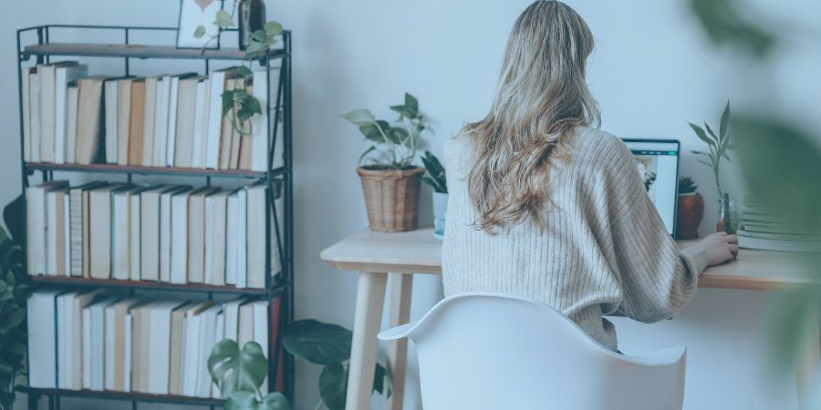 Hybrid worker on her laptop at home