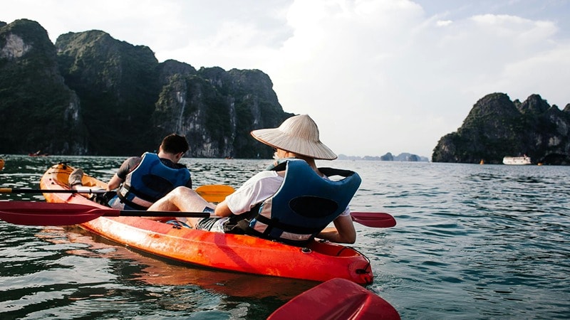 Tourist Kayaking with a Life Jacket On