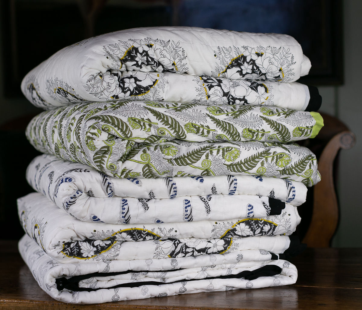 Pile of handblockprinted cotton quilts 