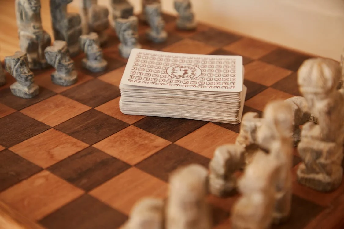 A deck of cards on a chess board