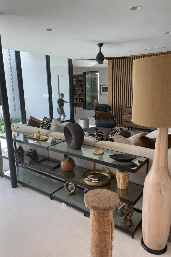 a designer enters a home in the middle of an interior design installation