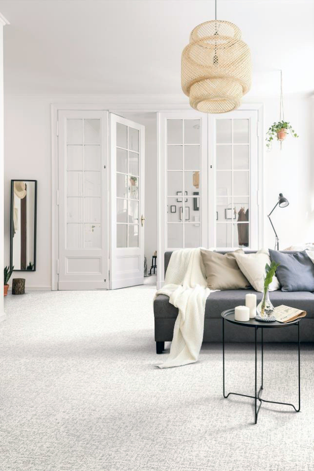 Living room with white carpet