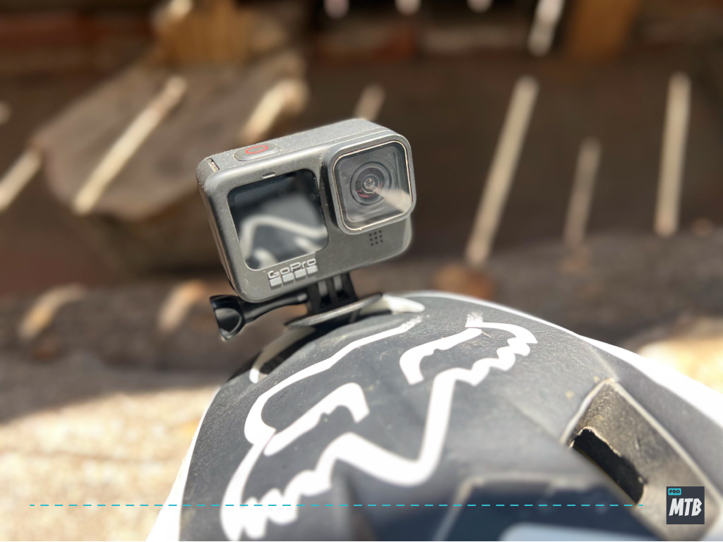 An image showcasing the best GoPro for mountain biking, the GoPro Hero 9, mounted on a handlebar with a sturdy and adjustable mount.