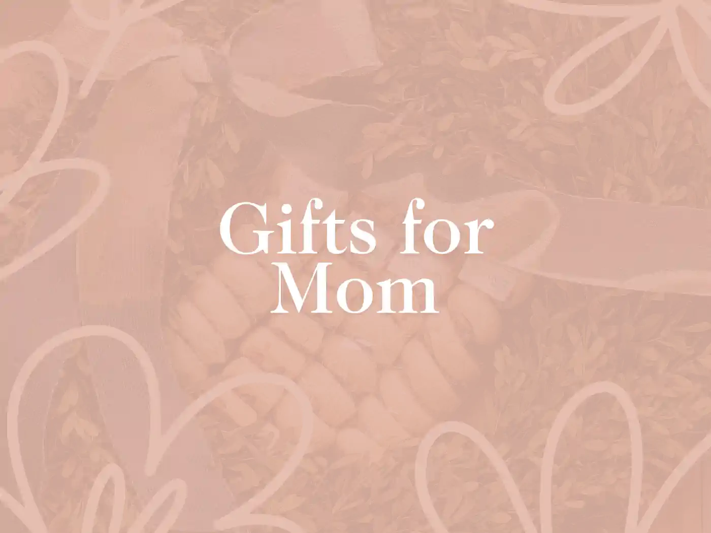 Stylized text reading 'Gifts for Mom' against a soft, floral background, highlighting the care behind the perfect gift boxes for mum. Delivered with heart. Fabulous Flowers and Gifts.