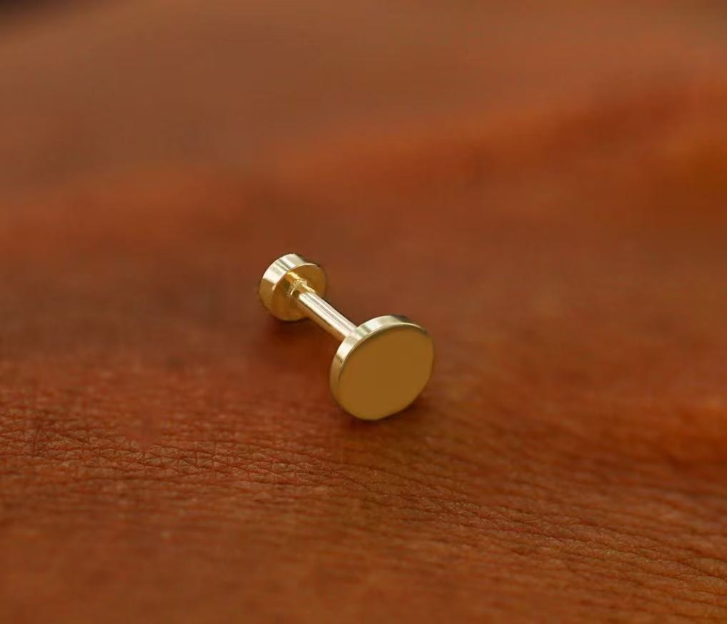 How to remove flat back earrings?