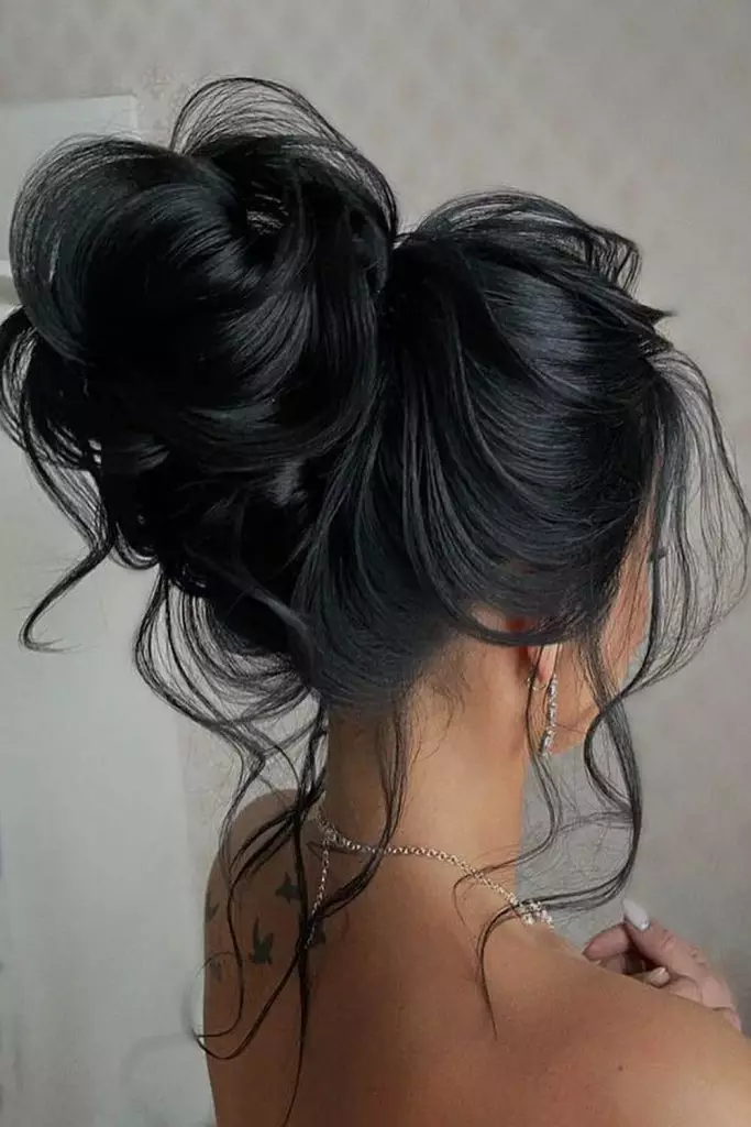Textured Messy High Bun With Bangs hairstyle