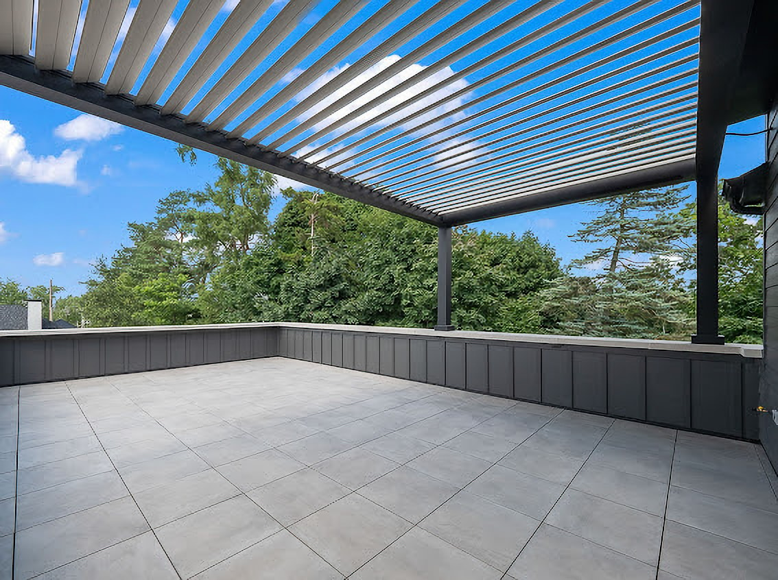 Roof top pergola install. Beautiful day, so the louvers on the roof are open.