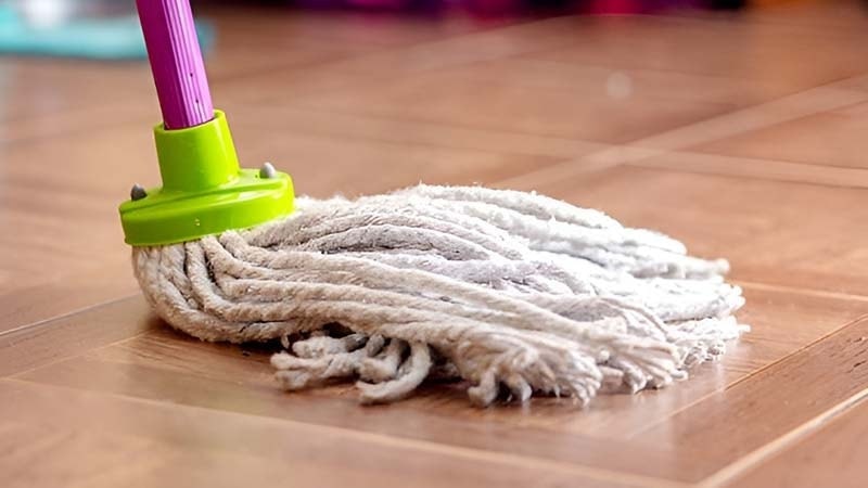 Cut-end mop on a wood floor