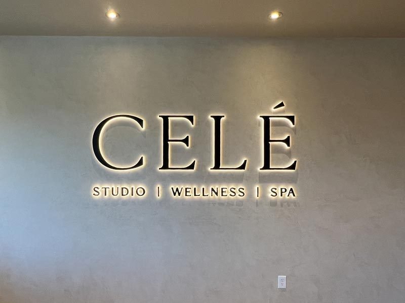 Celé Wellness – This halo-lit channel letter lobby sign creates a soothing glow that perfectly complements the calming atmosphere of their space.