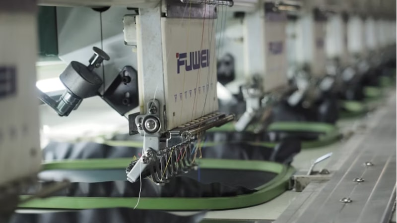 An embroidery machine in action 