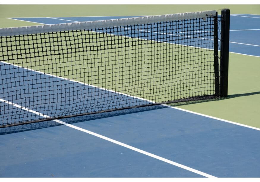 Two tennis courts with net in the middle