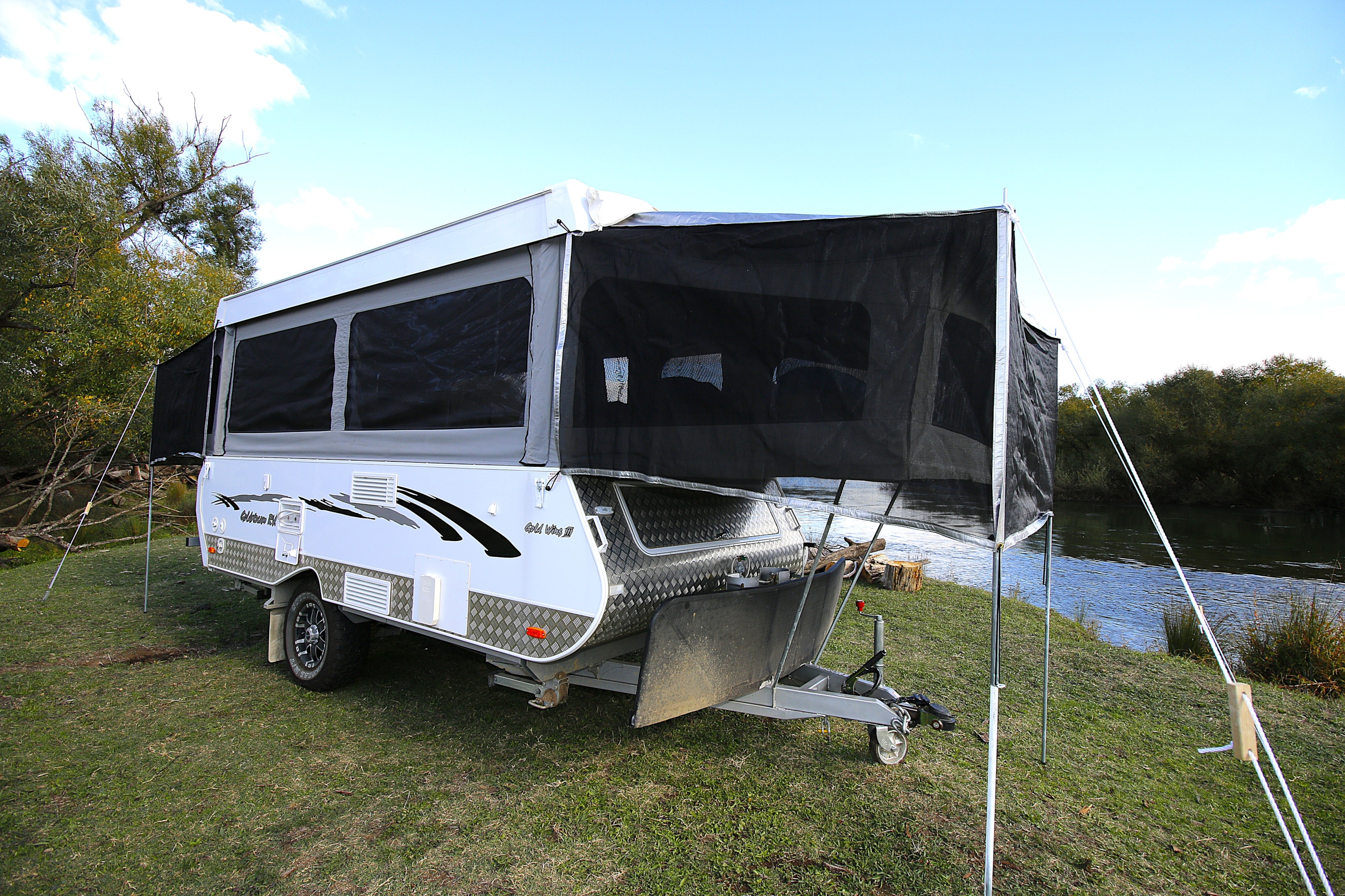 The extended shroud acts like a tropical rood over the queen size bed for terrific sleeping arrangements.