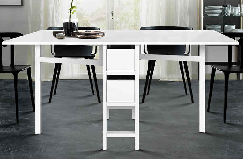 The Artiss Gateleg white dining table folds out on either side to give you plenty of room for entertainment, and has two convenient storage drawers for crockery, game pieces and more.
