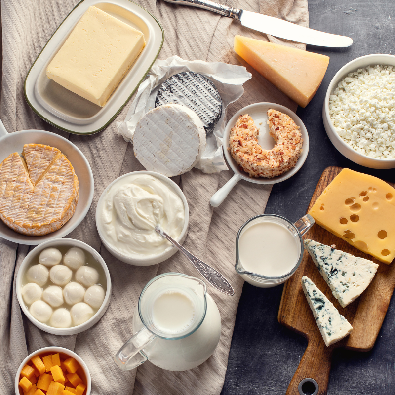 Picture of dairy products including cottage cheese, milk, and Greek yogurt.