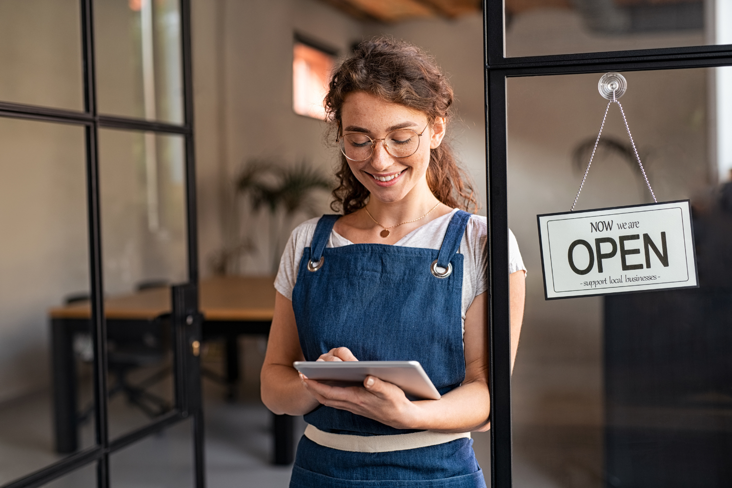A smiling business owner.