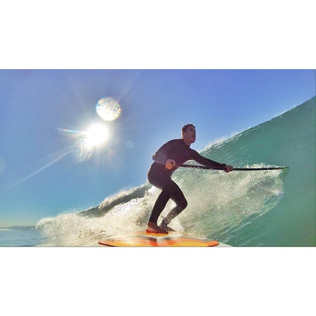 surfing a paddle board