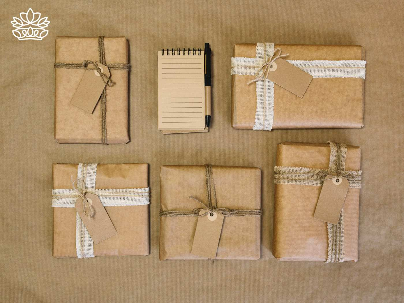 Rustic style gender-neutral gift boxes, each uniquely customized with tags and ribbons, offering accessible gifting ideas for any occasion, night or day, from the Gender Neutral Gift Boxes Collection at Fabulous Flowers and Gifts.