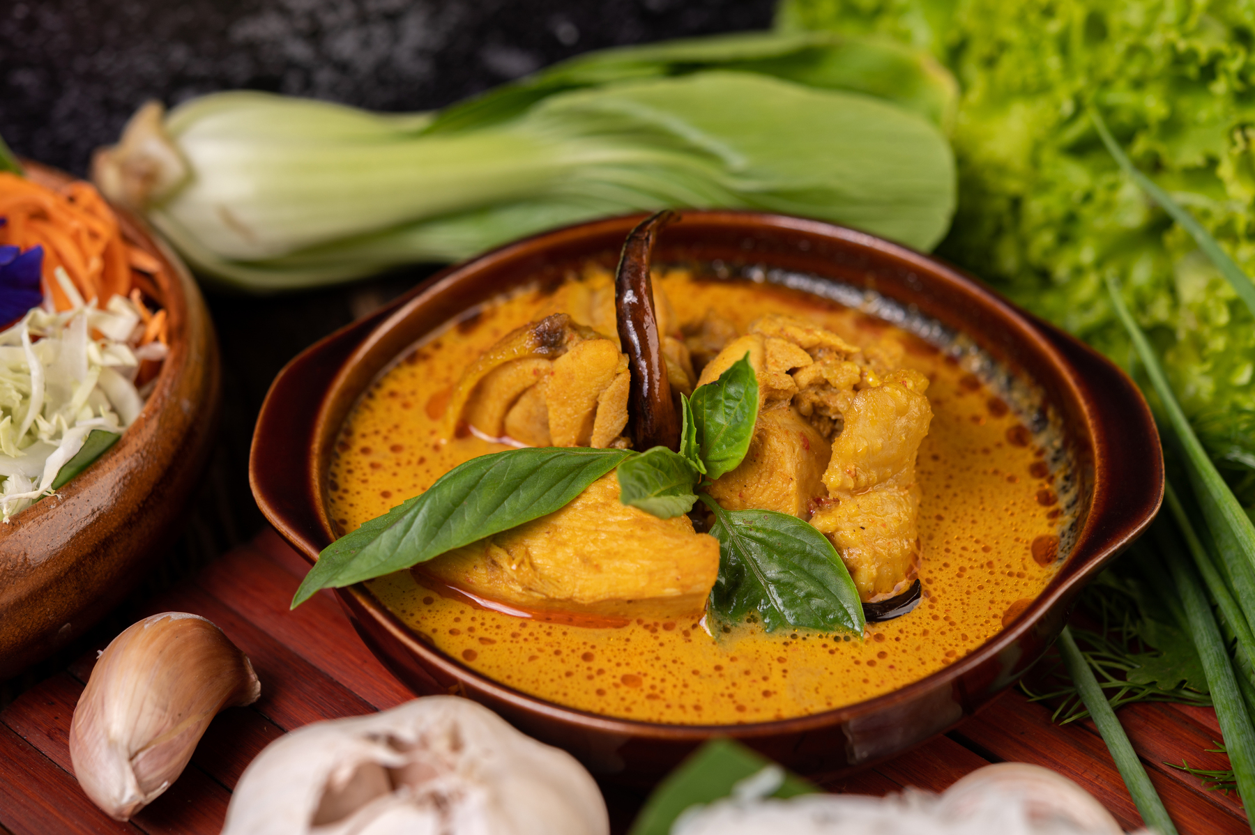 Raj's Corner Hamilton - Delicious fish curry served in a bowl.