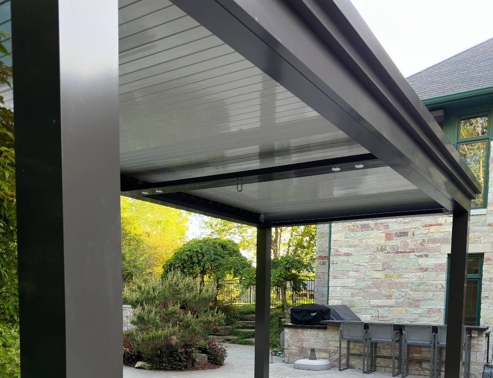smart pergolas with extruded aluminum pieces over patio and mount for ceiling fans