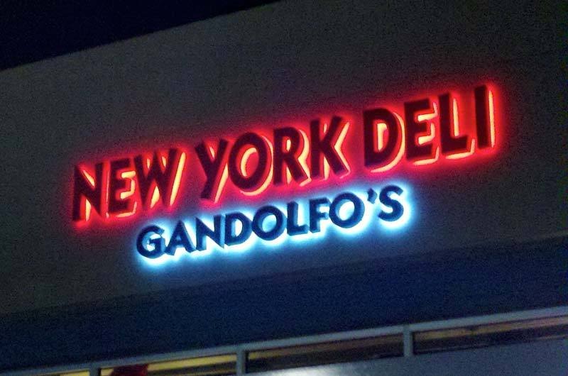 Halo-lit channel letters illuminated with neon give Gandolfo’s New York Deli a bold, retro-inspired glow that stands out day and night in Oxnard.