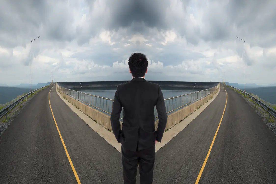 Businessperson choosing between a fast deal and a thorough process in a business sale decision