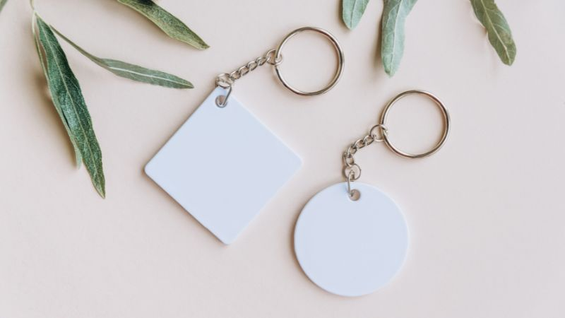 2 beautiful white colored acrylic keychains.
