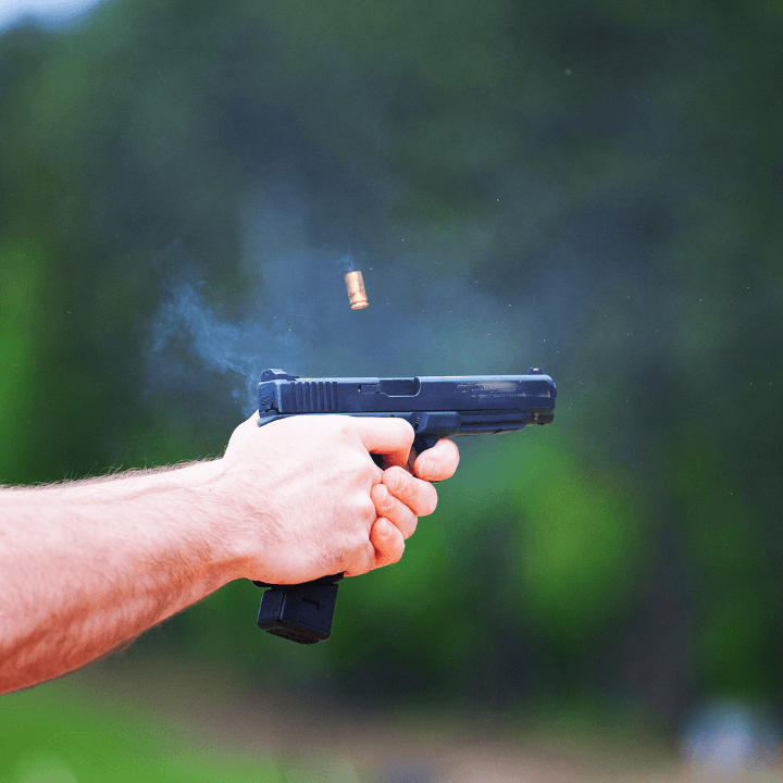 close up of a handgun being shot