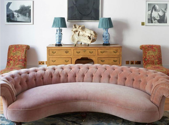 blush pink tufted low-back sofa