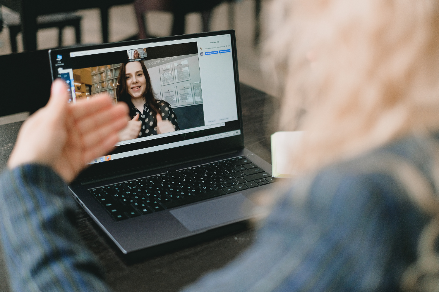 A Western interviewer via video call.