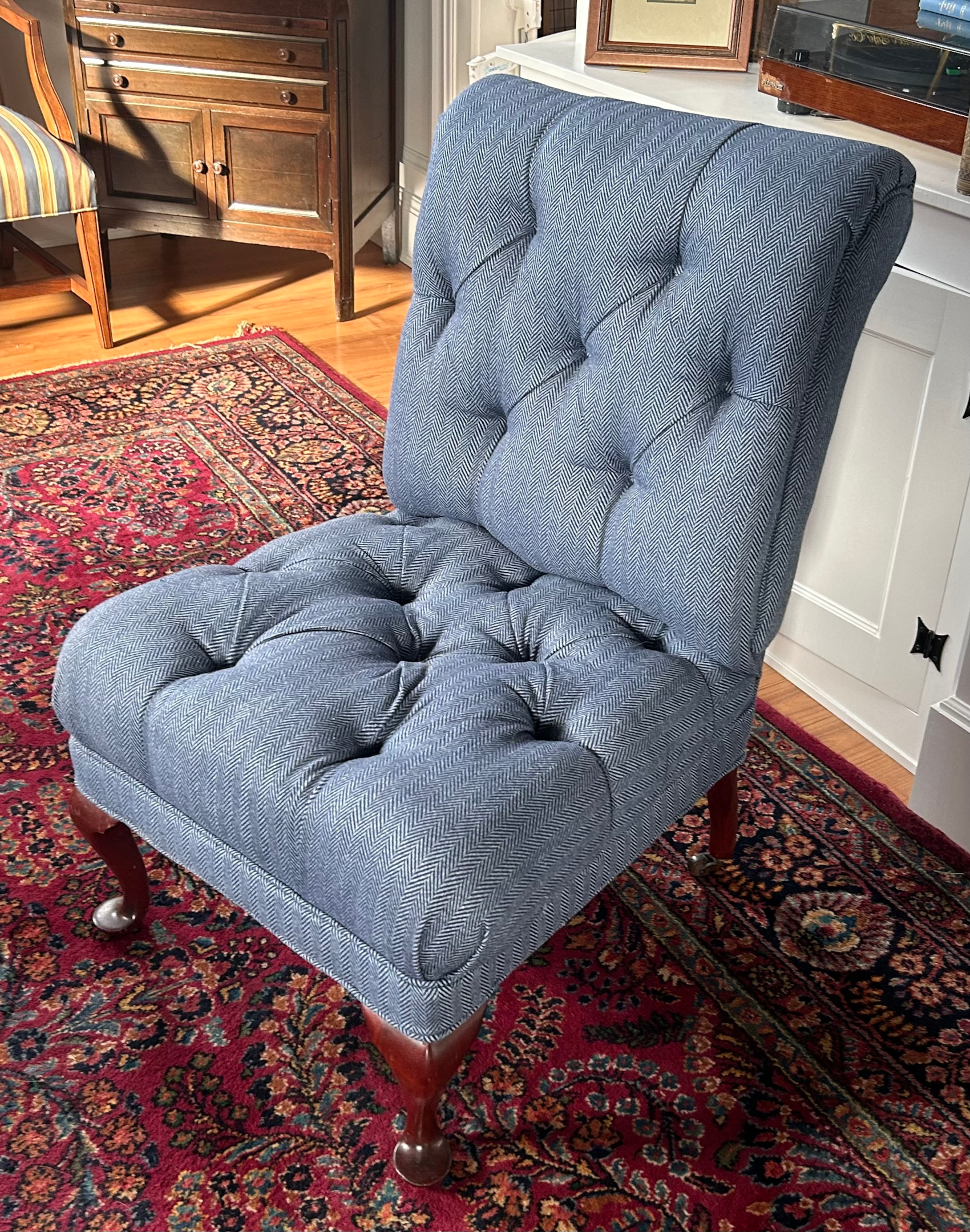 Reupholstered antique slipper chair