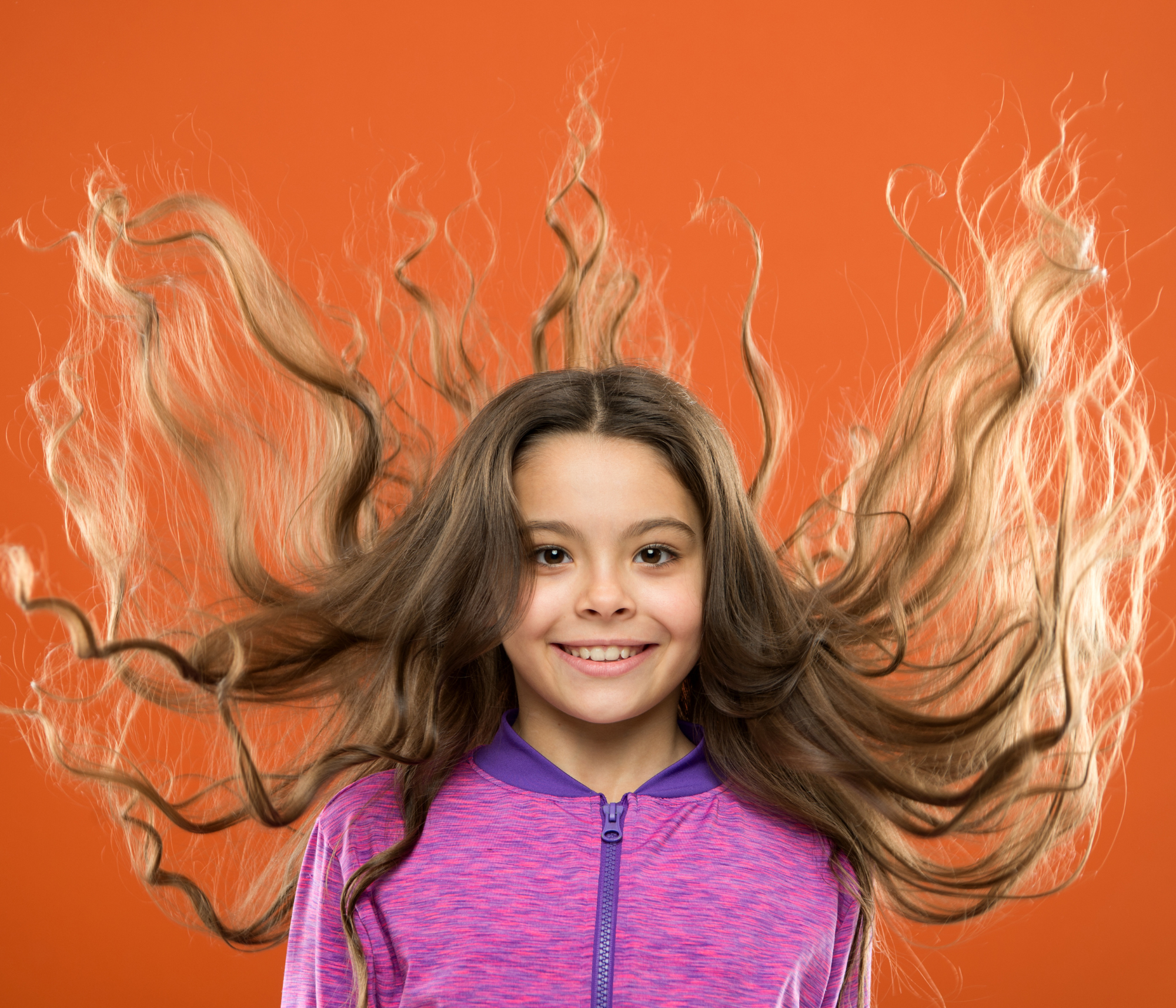 girl with hair flying