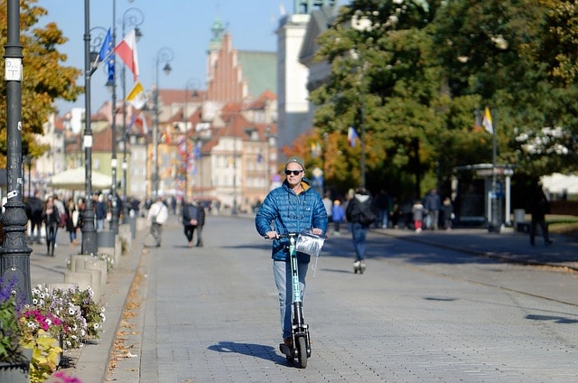 An older man on an electric scooter.
