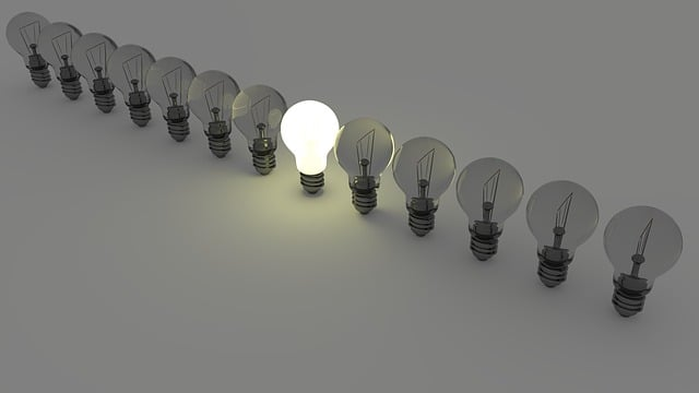 bright lightbulb in a line of dark bulbs showing how good keyword research and branding in your product listings helps