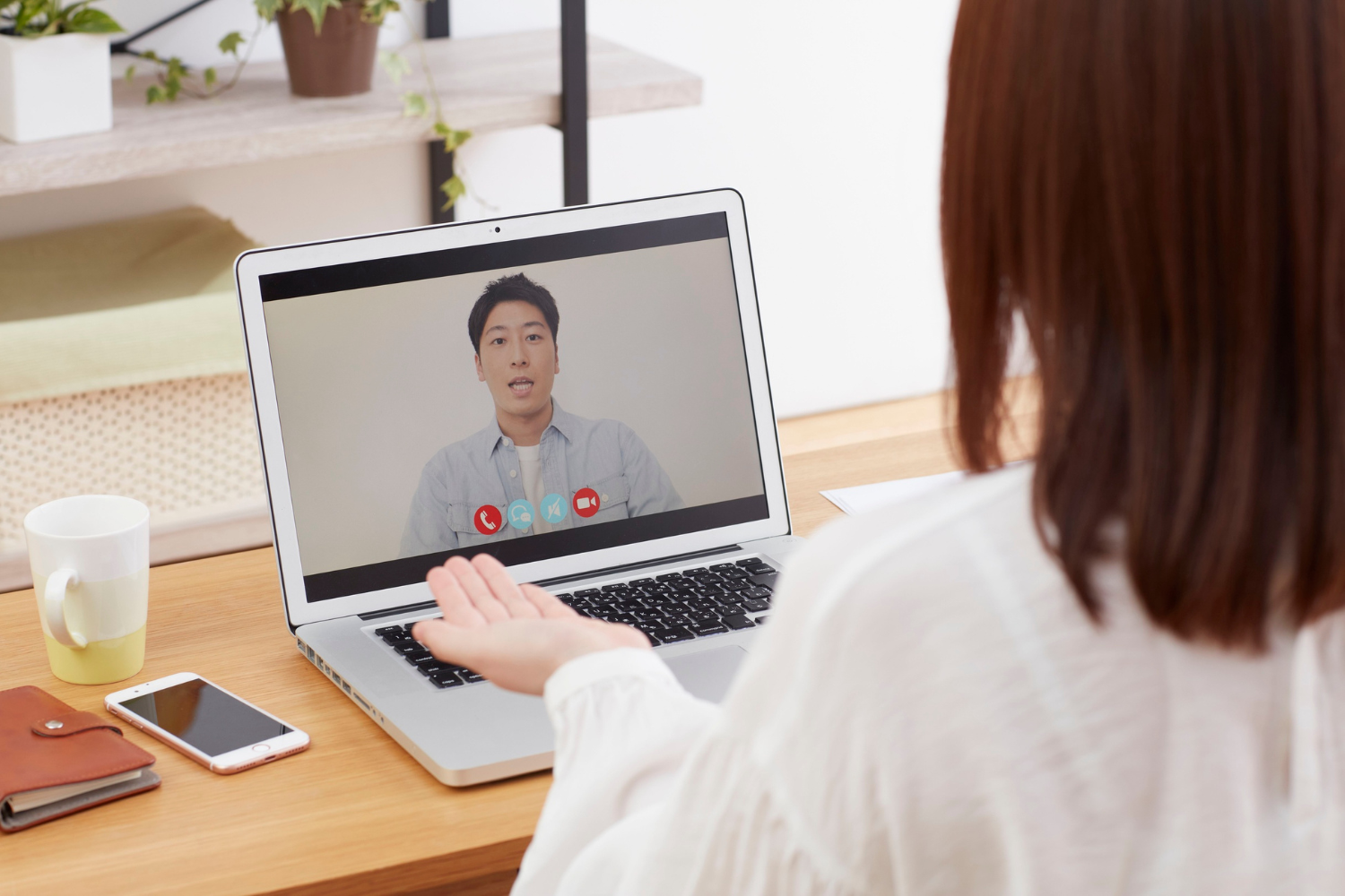 A one-on-one video meeting between a manager and a team member.