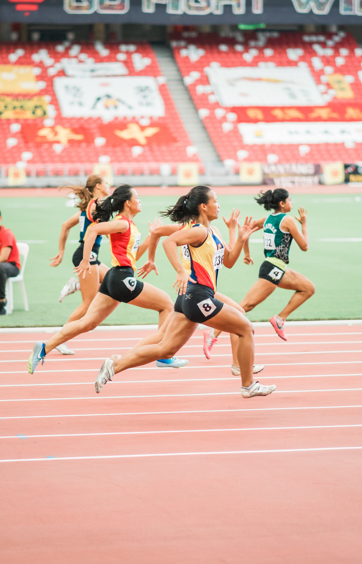Competição de sprint feminino. Foto de Jonathan Chng, Unsplash.