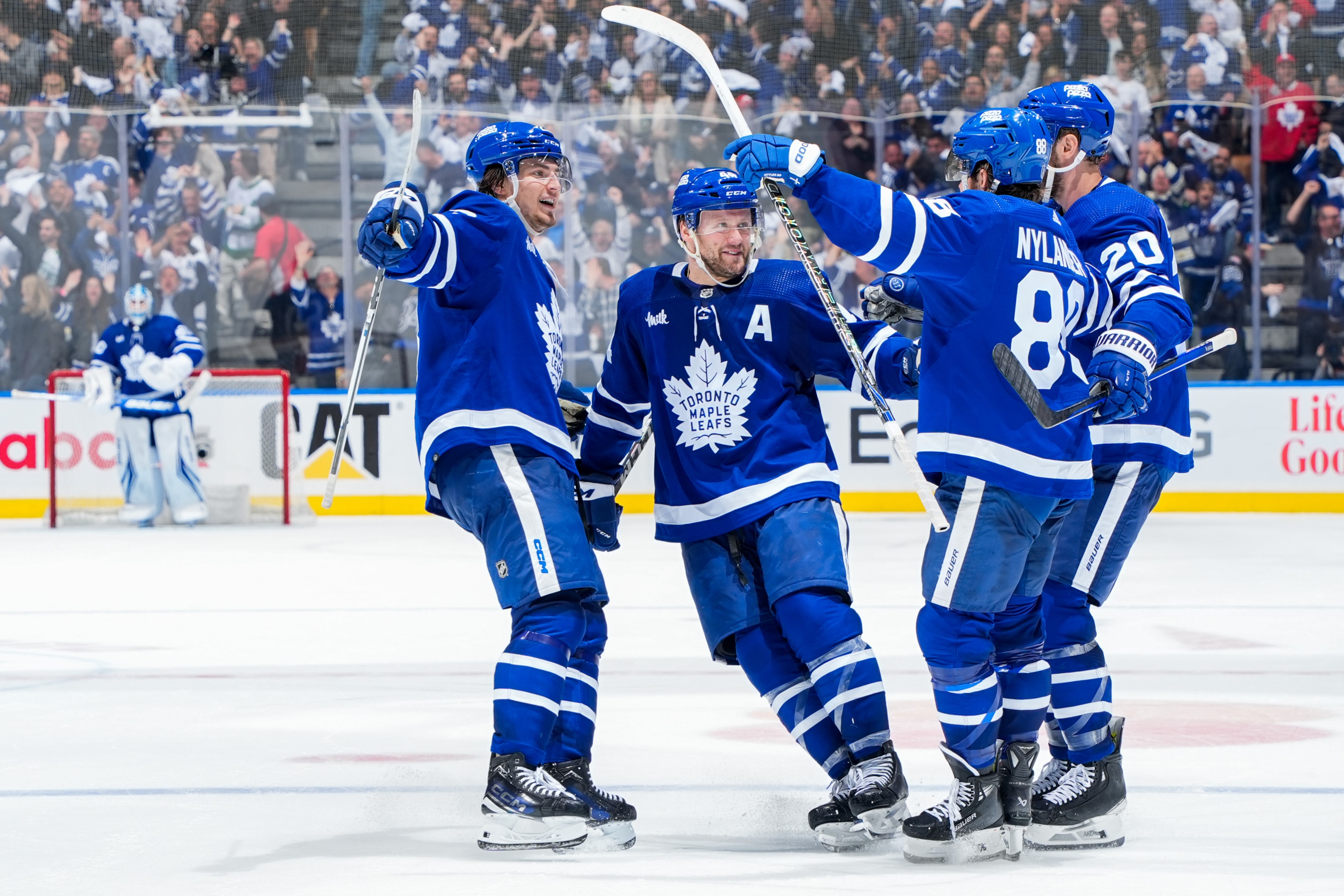 William Nylander of the Toronto Maple Leafs celebrates his goal against the Boston Bruins with teammates Matthew Knies, Morgan Rielly and Joel Edmundson during the third period in Game Six of the First Round of the 2024 Stanley Cup Playoffs at Scotiabank Arena on May 2, 2024 in Toronto, Ontario, Canada. 