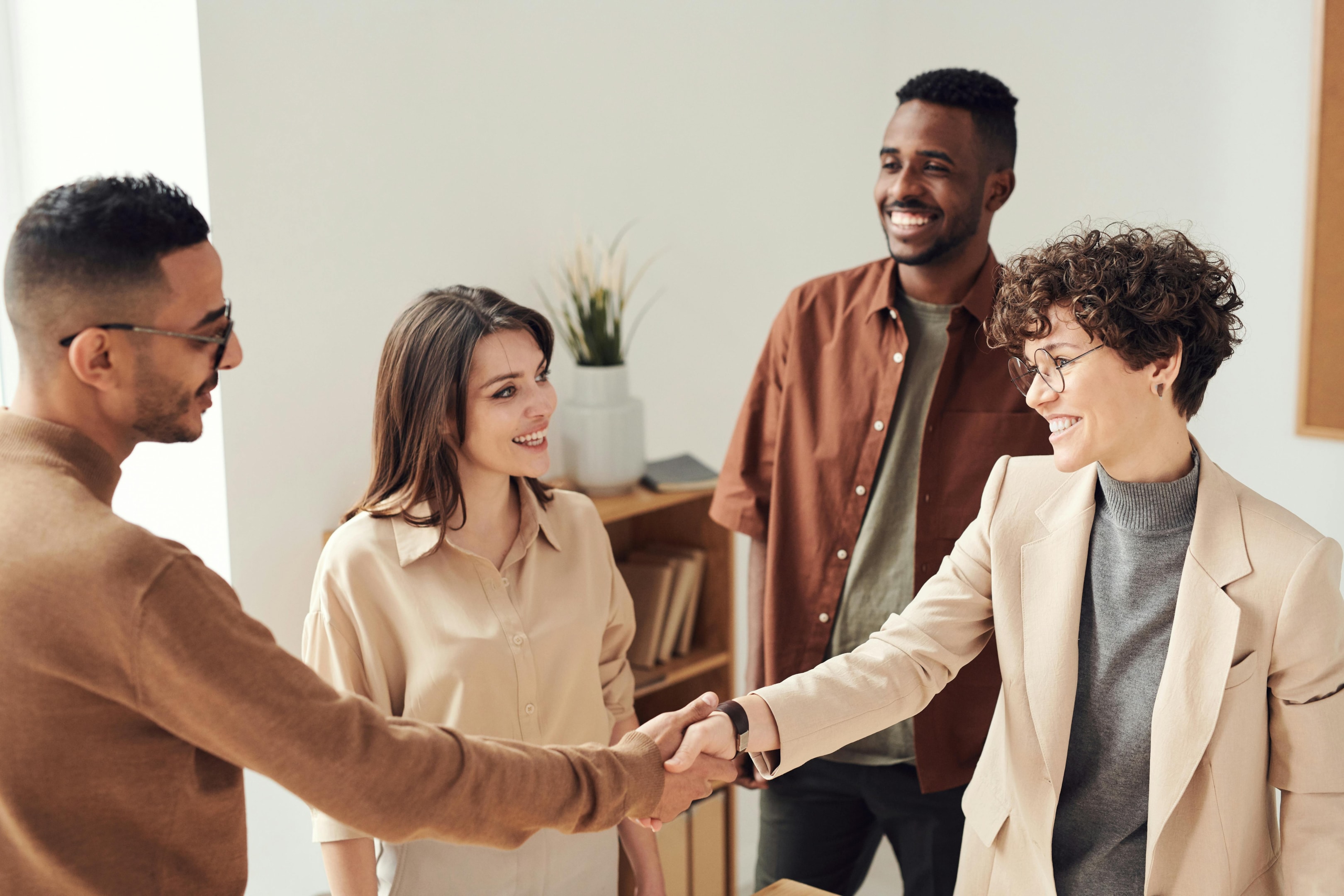 Real estate agent meets with recent beneficiaries.