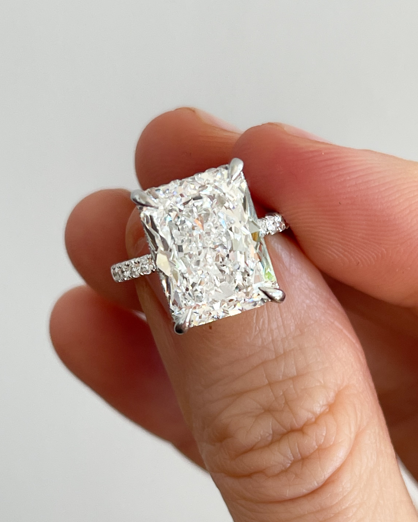 A 7 carat Radiant Cut diamond in our Signature Pavé engagement ring