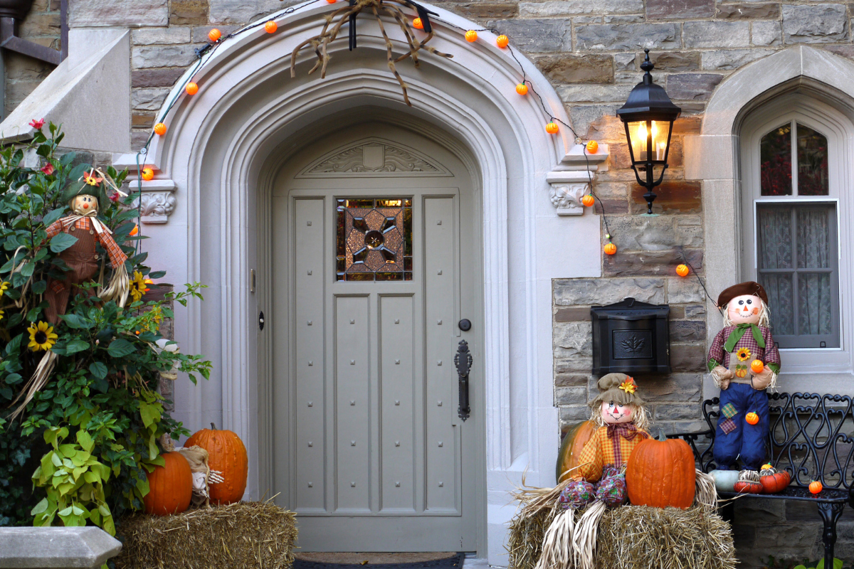 A spooky wreath decorated with dried flowers and spider webbing, perfect for diy Halloween decorations.