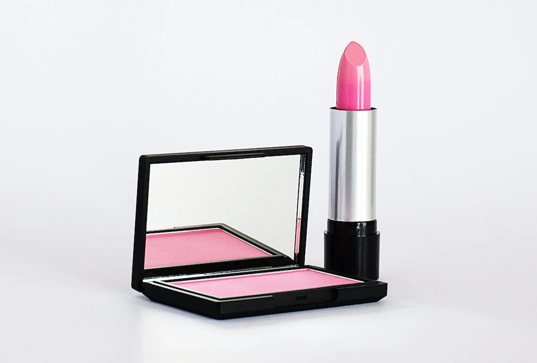 Close-up image of a lipstick and blush-on
