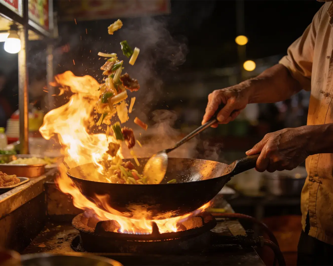 Chef skillfully tosses vibrant vegetables in a flaming wok at a street food stall, creating an energetic and lively culinary scene.