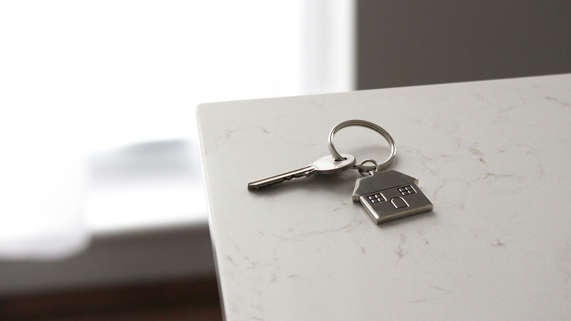 a house key on a table
