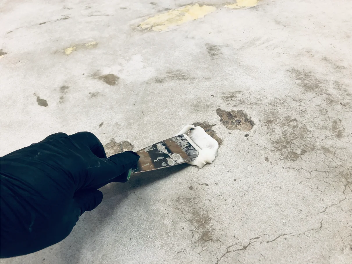 repairing cracks in outdoor surfaces prior to epoxy floor coatings application